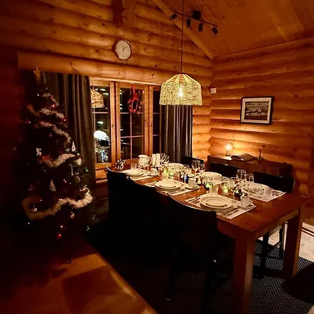 Atmospheric Log By The Tracks Chalet